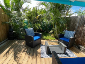 Duplex TIFANJAN avec jardin fleuri près de la mer